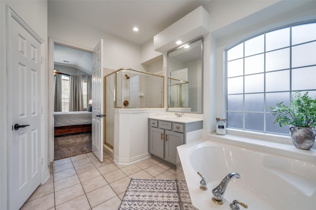2750 Bandolier Ln, Frisco, TX 75033 - full bathroom with a bath, a stall shower, vanity, ensuite bath, and tile patterned floors
