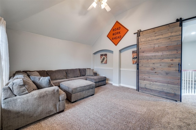 2750 Bandolier Ln, Frisco, TX 75033 - carpeted living area featuring ceiling fan, vaulted ceiling, and a barn door