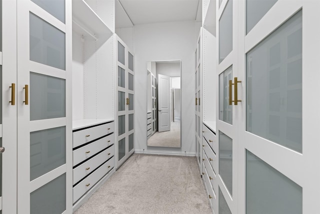 8509 Barnbougle Dunes Dr, Mckinney, TX 75070 - walk in closet featuring light colored carpet and french doors