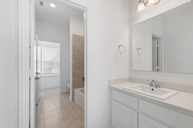 8509 Barnbougle Dunes Dr, Mckinney, TX 75070 - full bathroom featuring vanity, tile patterned floors, toilet, shower / tub combination, and baseboards