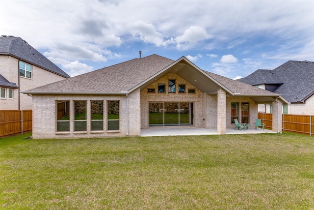 518 Syracuse St, Haslet, TX 76052 - back of property with brick siding, roof with shingles, and a patio area