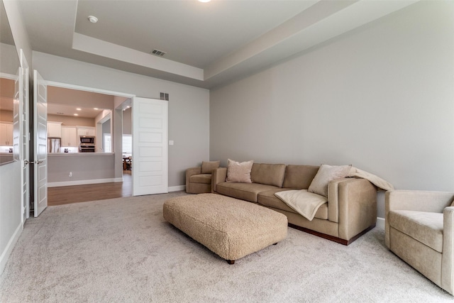 518 Syracuse St, Haslet, TX 76052 - living room with light carpet, a raised ceiling, and baseboards