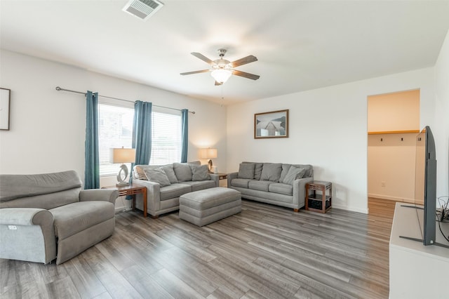 1401 Ancer Way, Fort Worth, TX 76052 - living room featuring ceiling fan and light wood-style floors