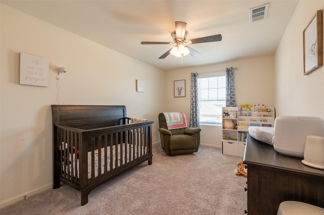 1401 Ancer Way, Fort Worth, TX 76052 - carpeted bedroom featuring a crib, baseboards, and a ceiling fan