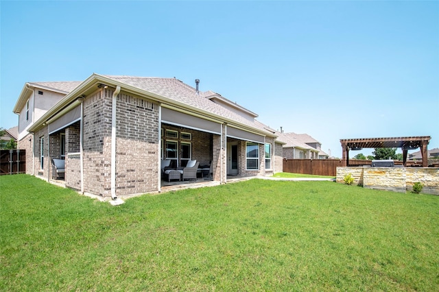 4426 Mineral Creek Trl, Celina, TX 75078 - back of property featuring brick siding, a patio area, and a shingled roof