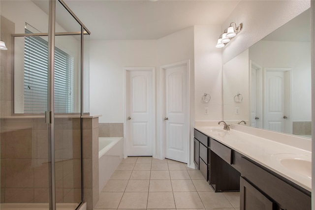 2154 Slow Stream Dr, Royse City, TX 75189 - full bath with tile patterned flooring, a bath, double vanity, and a stall shower