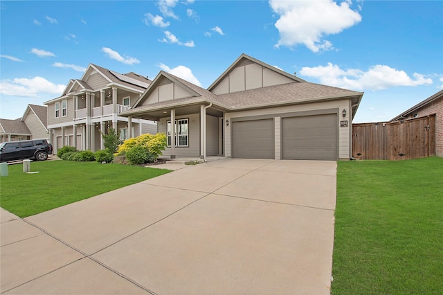 2154 Slow Stream Dr, Royse City, TX 75189 - view of front facade with board and batten siding, a garage, driveway, covered porch, and a shingled roof