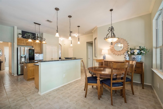 5312 Timber Park Dr, Flower Mound, TX 75028 - dining space featuring ornamental molding and baseboards