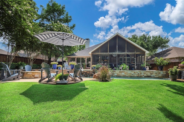 5312 Timber Park Dr, Flower Mound, TX 75028 - rear view of house with an outdoor fire pit, a sunroom, and a patio area