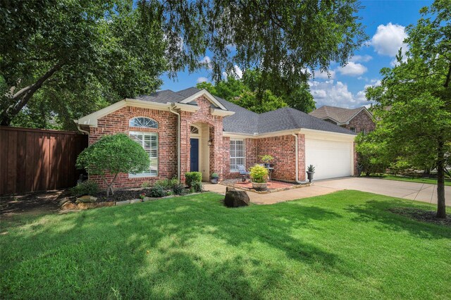 5312 Timber Park Dr, Flower Mound, TX 75028 - view of front facade with brick siding, an attached garage, driveway, and roof with shingles