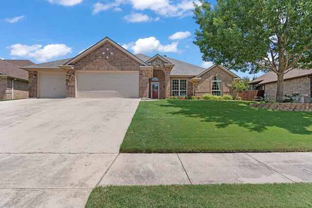 8228 Shady Valley Dr, Benbrook, TX 76116 - view of front of property with a garage, concrete driveway, and brick siding