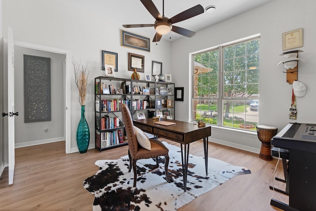 8228 Shady Valley Dr, Benbrook, TX 76116 - home office featuring ceiling fan, baseboards, and wood finished floors