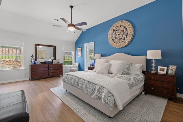 8228 Shady Valley Dr, Benbrook, TX 76116 - bedroom featuring vaulted ceiling, wood finished floors, baseboards, and ceiling fan