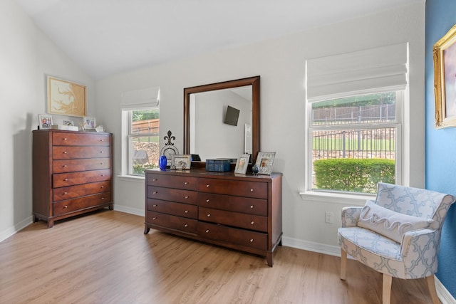 8228 Shady Valley Dr, Benbrook, TX 76116 - sitting room featuring light wood-style floors, lofted ceiling, and baseboards