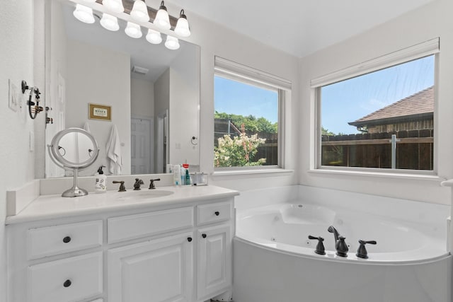 8228 Shady Valley Dr, Benbrook, TX 76116 - bathroom featuring vanity and a whirlpool tub