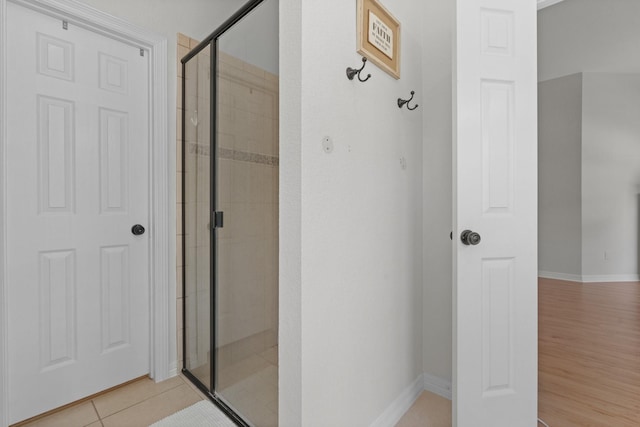 8228 Shady Valley Dr, Benbrook, TX 76116 - bathroom featuring a shower stall and baseboards