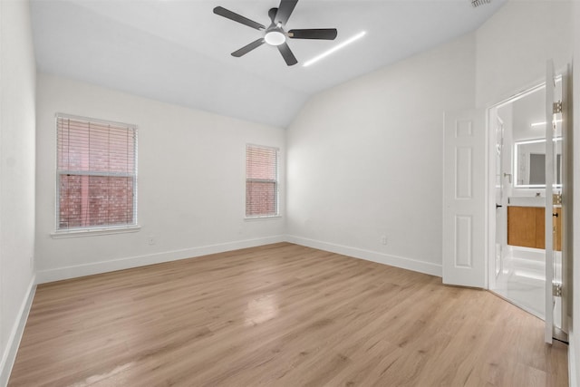 5809 Hidden Pine Ln, Mckinney, TX 75070 - unfurnished room featuring vaulted ceiling, a ceiling fan, light wood finished floors, and baseboards