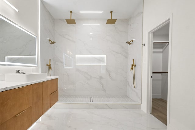 5809 Hidden Pine Ln, Mckinney, TX 75070 - full bathroom featuring vanity, a walk in closet, a marble finish shower, and marble finish floors