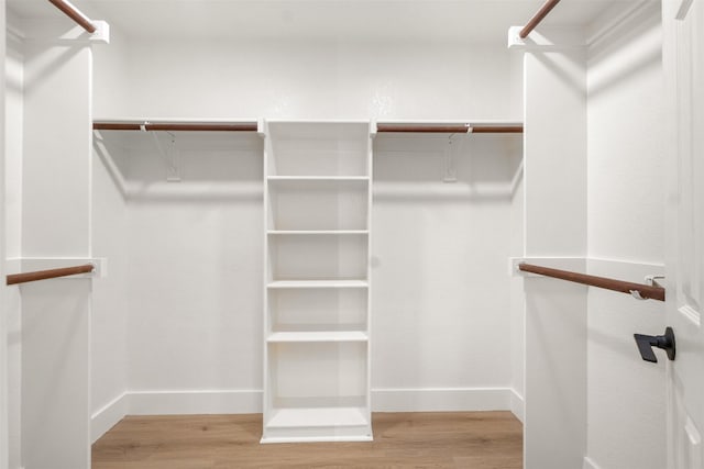 5809 Hidden Pine Ln, Mckinney, TX 75070 - spacious closet with wood finished floors