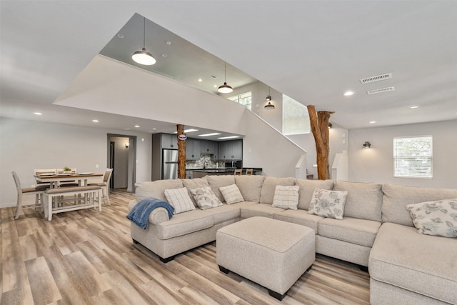 1327 Whispering Springs Dr, Tool, TX 75143 - living area featuring healthy amount of natural light, light wood-type flooring, and recessed lighting