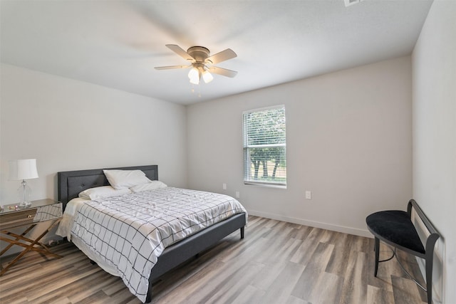 1327 Whispering Springs Dr, Tool, TX 75143 - bedroom featuring wood finished floors, ceiling fan, and baseboards