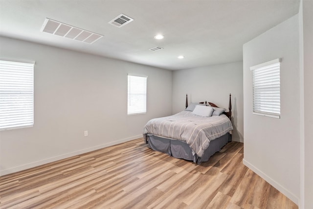 1327 Whispering Springs Dr, Tool, TX 75143 - bedroom with baseboards, light wood-style flooring, and recessed lighting