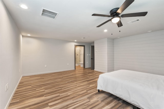 1327 Whispering Springs Dr, Tool, TX 75143 - bedroom with recessed lighting, baseboards, light wood-style flooring, connected bathroom, and a ceiling fan
