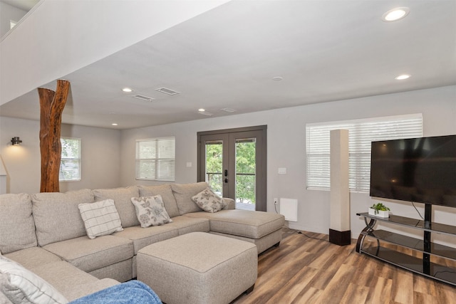 1327 Whispering Springs Dr, Tool, TX 75143 - living room with wood finished floors, plenty of natural light, recessed lighting, french doors, and baseboards