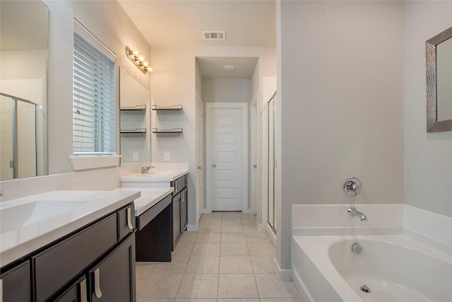 2151 Slow Stream Dr, Royse City, TX 75189 - bathroom with a shower stall, vanity, a bath, tile patterned flooring, and baseboards