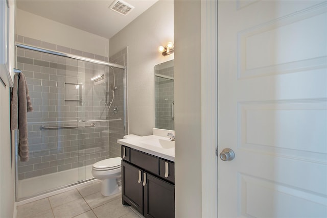 2151 Slow Stream Dr, Royse City, TX 75189 - full bath featuring a shower stall, tile patterned flooring, vanity, and toilet
