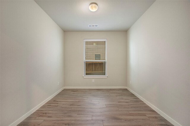 2151 Slow Stream Dr, Royse City, TX 75189 - spare room with light wood-style floors and baseboards