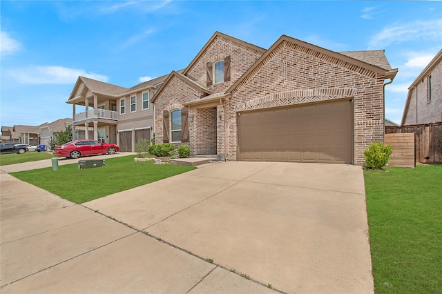 2151 Slow Stream Dr, Royse City, TX 75189 - view of front of house featuring brick siding, concrete driveway, and an attached garage