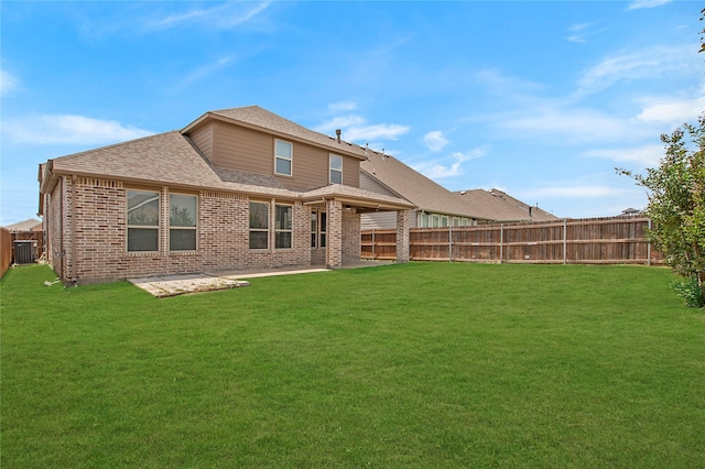 2151 Slow Stream Dr, Royse City, TX 75189 - back of house with brick siding, roof with shingles, cooling unit, and a patio