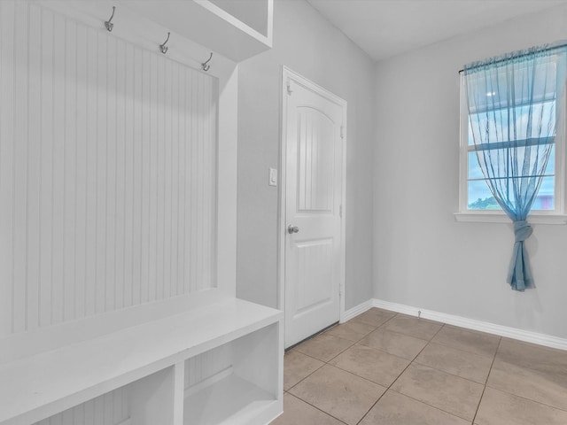 1013 Northern Oaks Ct, Springtown, TX 76082 - mudroom with light tile patterned floors and baseboards