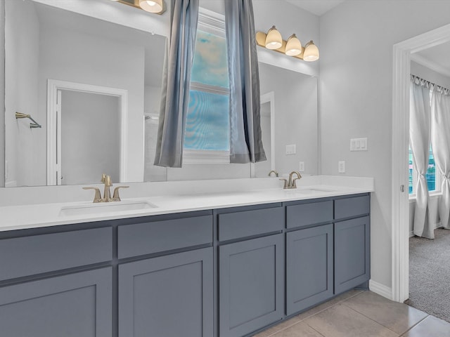 1013 Northern Oaks Ct, Springtown, TX 76082 - full bath with double vanity, tile patterned floors, and baseboards