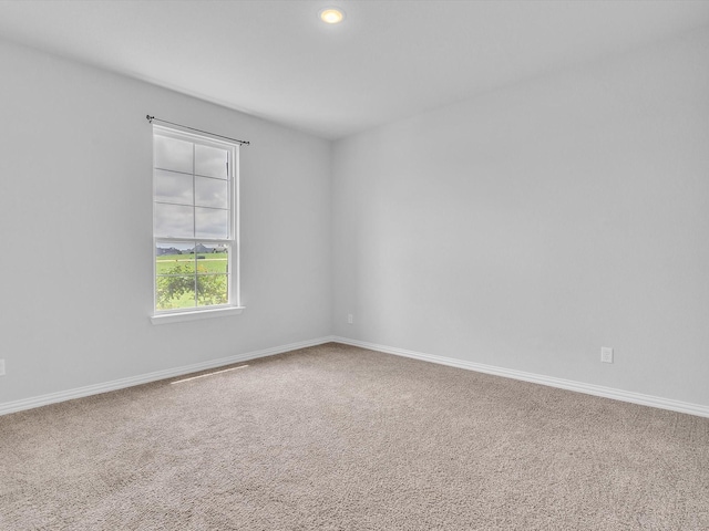 1013 Northern Oaks Ct, Springtown, TX 76082 - carpeted spare room with baseboards and recessed lighting