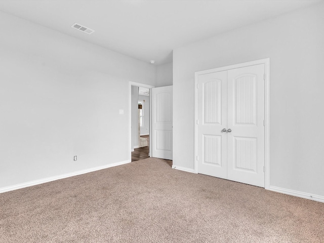 1013 Northern Oaks Ct, Springtown, TX 76082 - unfurnished bedroom featuring carpet, a closet, and baseboards