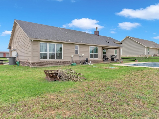 1013 Northern Oaks Ct, Springtown, TX 76082 - rear view of property with brick siding, a chimney, a patio, central AC unit, and roof with shingles