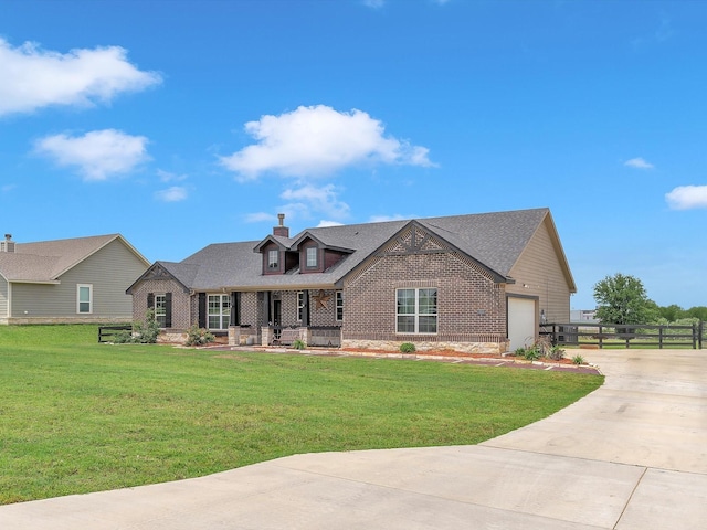 1013 Northern Oaks Ct, Springtown, TX 76082 - view of front facade with driveway, brick siding, a chimney, and covered porch