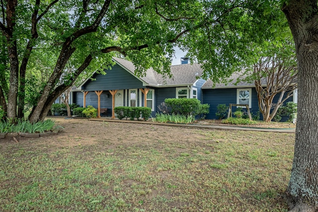 200 Settlers Bnd, Lowry Crossing, TX 75069 - view of front of property featuring a front yard and a shingled roof