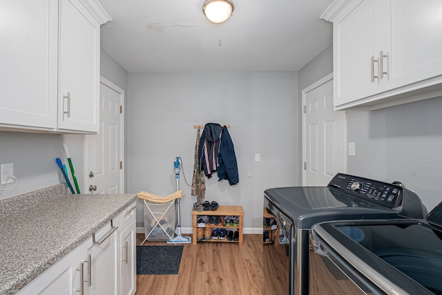 200 Settlers Bnd, Lowry Crossing, TX 75069 - washroom with independent washer and dryer, light wood-type flooring, cabinet space, and baseboards