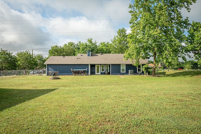 200 Settlers Bnd, Lowry Crossing, TX 75069 - rear view of house featuring a fire pit, a chimney, and roof with shingles