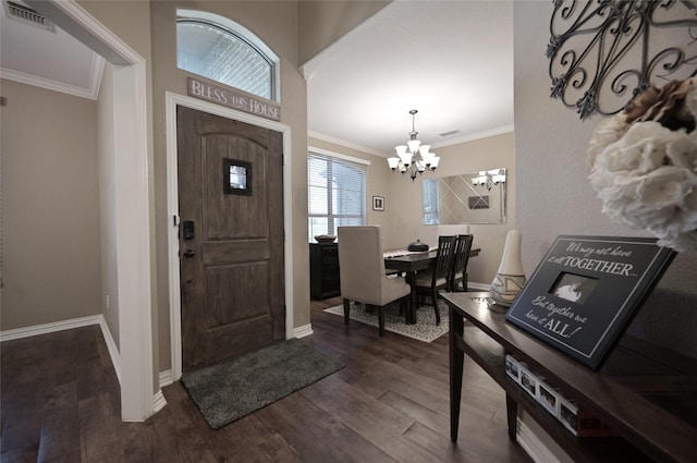 606 Brandt St, Grandview, TX 76050 - foyer entrance featuring crown molding, a chandelier, dark wood finished floors, and baseboards