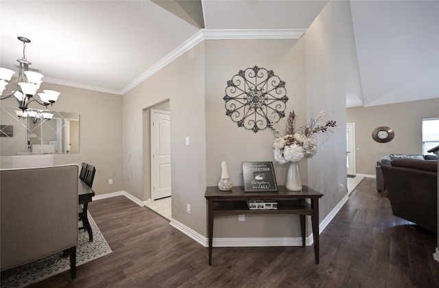 606 Brandt St, Grandview, TX 76050 - dining space featuring a chandelier, wood finished floors, crown molding, baseboards, and lofted ceiling