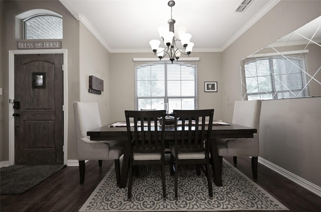 606 Brandt St, Grandview, TX 76050 - dining room with a chandelier, wood finished floors, baseboards, and ornamental molding