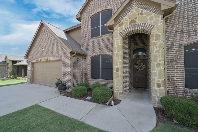 606 Brandt St, Grandview, TX 76050 - view of front of home with brick siding, an attached garage, driveway, stone siding, and roof with shingles
