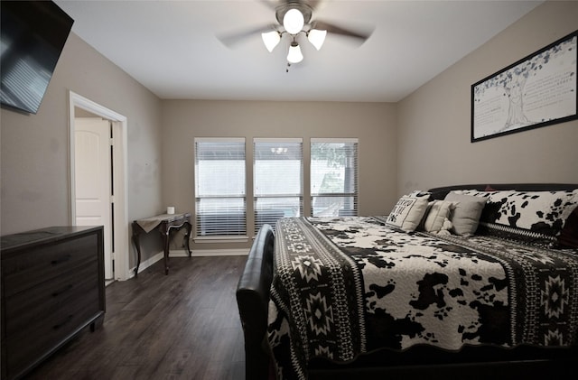 606 Brandt St, Grandview, TX 76050 - bedroom featuring dark wood finished floors, a ceiling fan, and baseboards