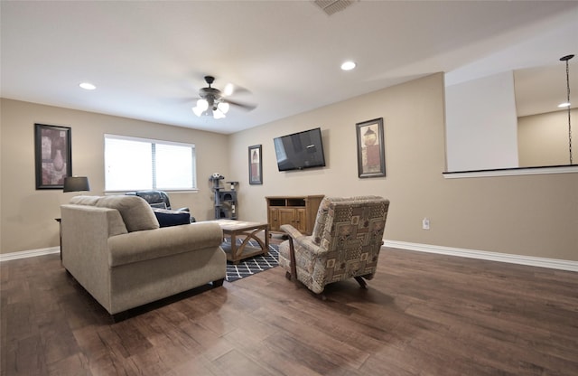 606 Brandt St, Grandview, TX 76050 - living area featuring baseboards, dark wood finished floors, a ceiling fan, and recessed lighting