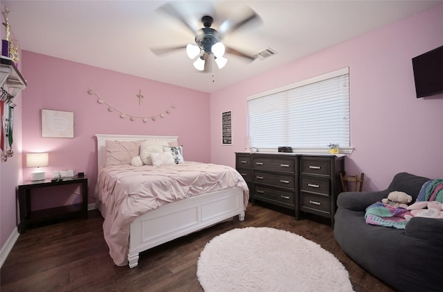 606 Brandt St, Grandview, TX 76050 - bedroom featuring dark wood-type flooring, ceiling fan, and baseboards