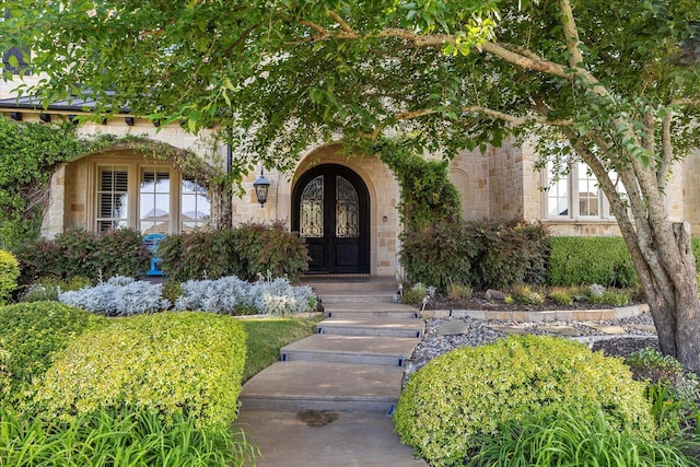 1229 Manchester Dr, Mclendon Chisholm, TX 75032 - property entrance with stone siding and french doors